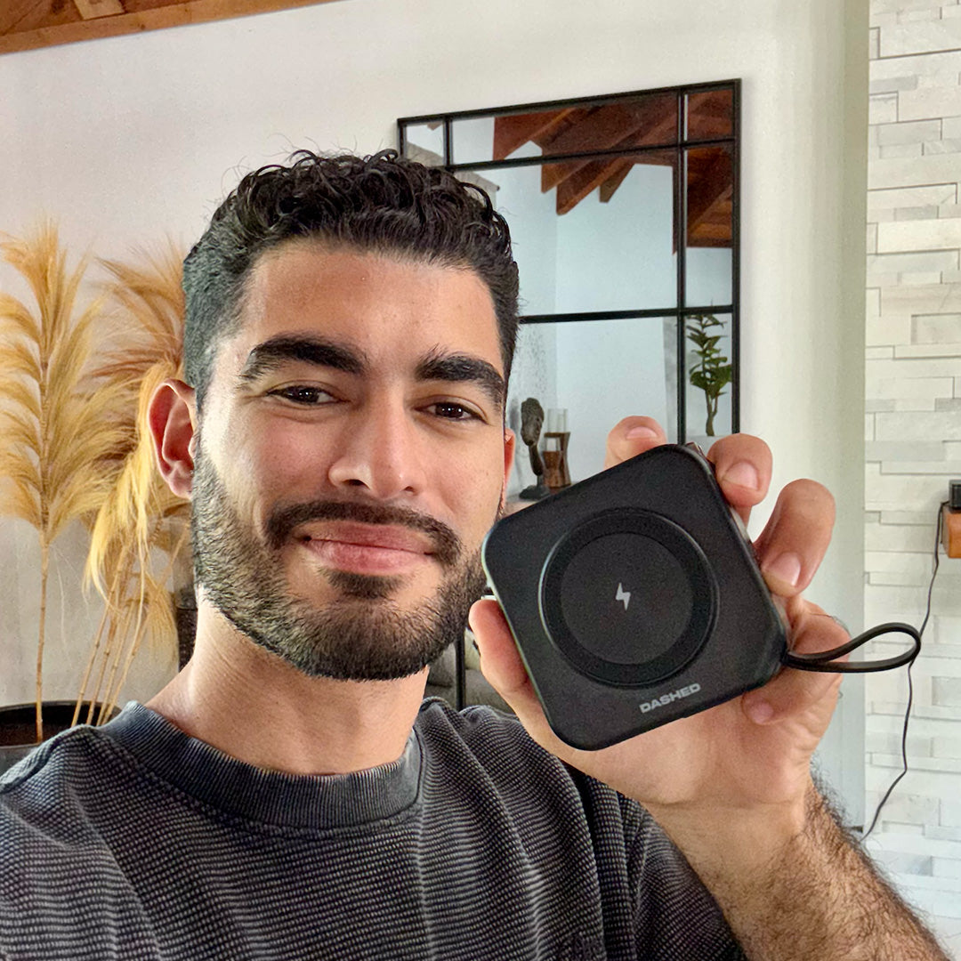 Man holding black travel Charger