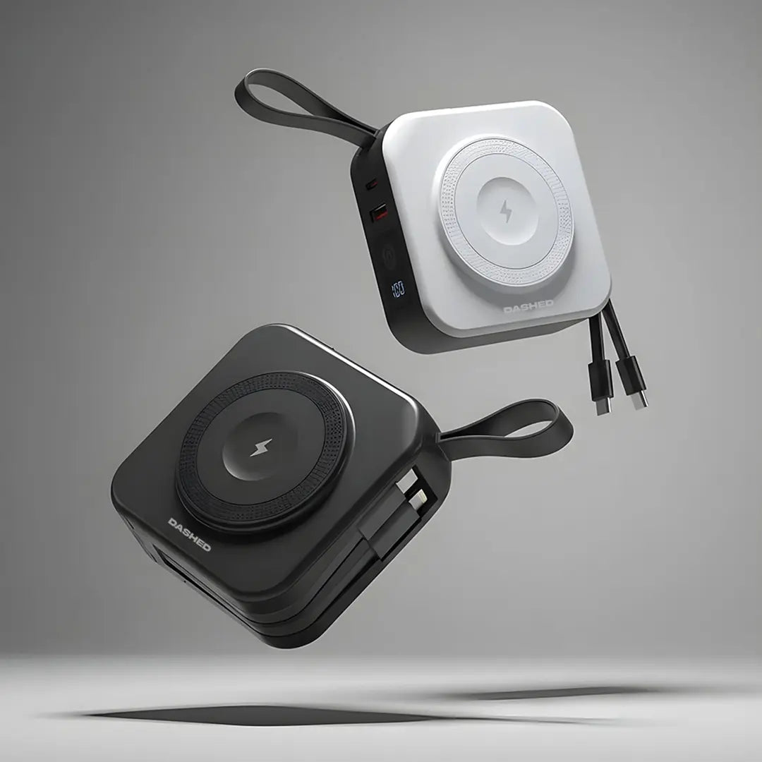 black and white travel charger, showing built in cords and wireless charging pad.