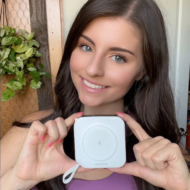 Woman holding White Travel Charger